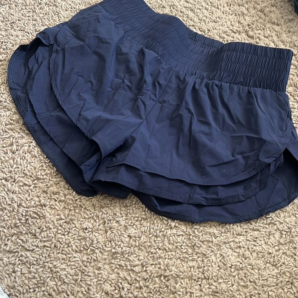 Loose blue athletic shorts for golf or working out